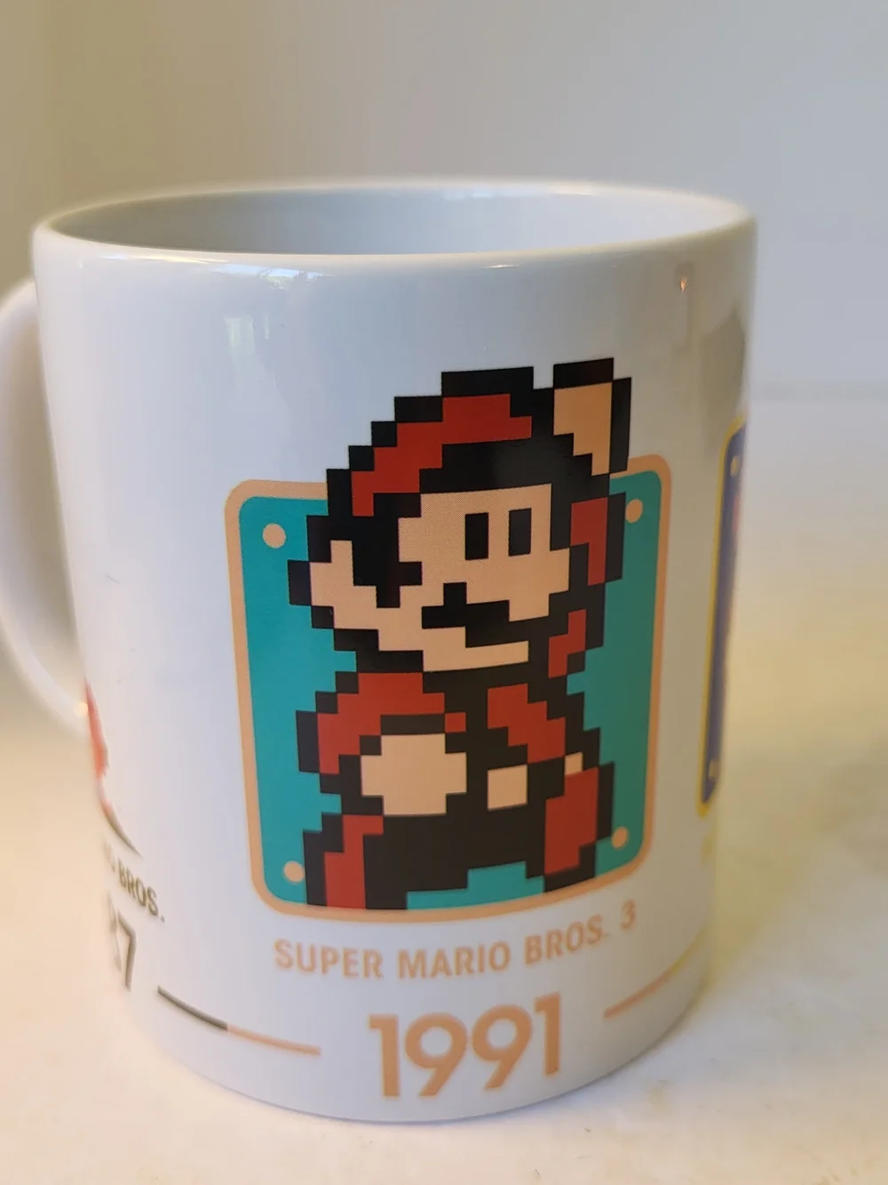 Nintendo Super Mario Evolution  Dates 1985-2006 Mug